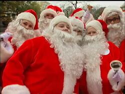 Dozens of fully suited Santas took to the streets of New York City with bells in hand as part of the 107th annual Sidewalk Santa Parade. News Clip
