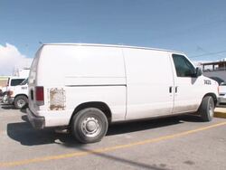 MS PAN Shot of Car with exterior of Mexican CSI lab AUDIO / Ciudad Juarez, Juarez, Mexico Stock Footage