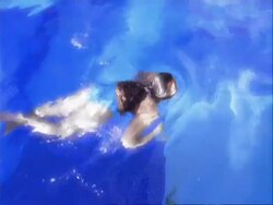 MS young woman swimming breast stroke Stock Footage
