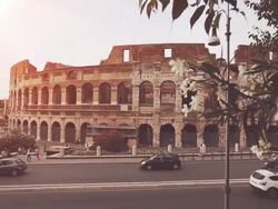Road and traffic the Coliseum, in Rome Stock Footage
