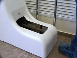 machine for dressing shoe covers Stock Footage