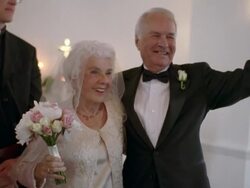 MS ZI CU Senior couple in church, then they wave and hug / Port Gamble, Washington State, USA Stock Footage