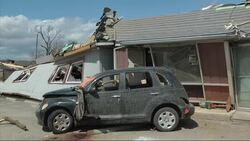 12 people were trapped in a storm cellar under an Illinois restaurant when a tornado ripped across the area. The storm is blamed for several deaths and the destruction of dozens of area homes. (April 10) Instructional Video
