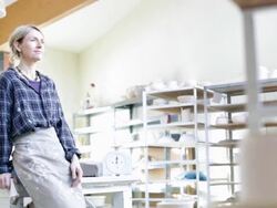 Portrait of female potter in studio Stock Footage