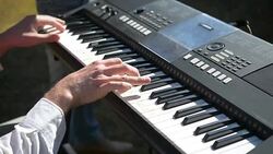 Man hands playing on the keyboard Stock Footage