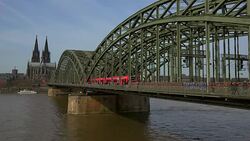 Cologne Cathedral with Hohenzollern Bridge, Cologne, North Rhine-Westphalia, Germany Stock Footage