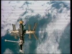 1997 high angle tracking shot space station Mir orbiting Earth Stock Footage