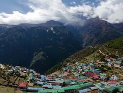 Time-lapse of a colorful village on a Himalayan mountainside. Stock Footage
