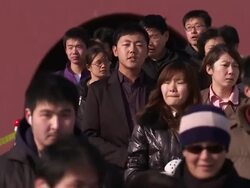 Tourists taking photos in Tiananmen Square News Clip