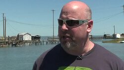 CLEAN : Off the US coast Tangier Island disappearing under the water News Clip