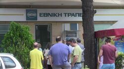 CLEAN : Greeks queue at ATMs with ECB set to decide on banks' fate News Clip
