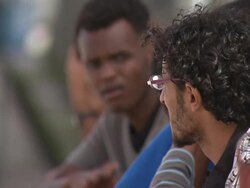 Refugees and migrants at a detention centre News Clip