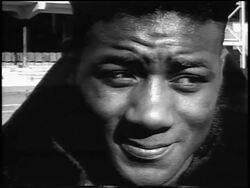 B/W 1956 close up PORTRAIT Floyd Patterson's face outdoors / newsreel Stock Footage