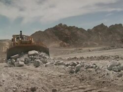 WS View of construction vehicle working on construction site / Namibia Stock Footage