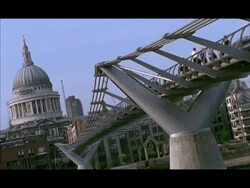 MS Angled view across millennium bridge to St Paul's cathedral, London, England Stock Footage