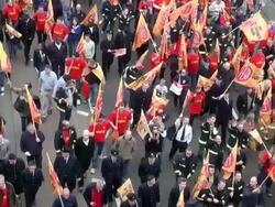 MS Public demonstrators with red flags / London, England, Great Britain   Stock Footage