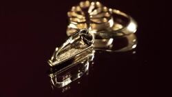 Gold suspension bracket rotate. Stock Footage