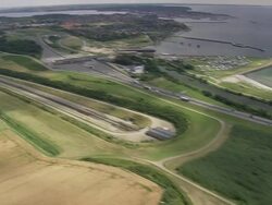 WS AERIAL ZI TS ZO View of Great belt bridge with toll plaza / Fyn, Denmark Stock Footage
