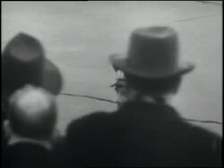 Russian cosmonaut Yuri Gagarin salutes Soviet Premier Nikita Khrushchev. News Clip