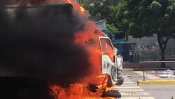 CLEAN : Protesters set truck ablaze in Venezuelan capital News Clip