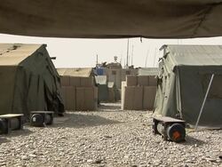 WS View of soldier running / Musa Qala, Helmand Province, Afghanistan.  Stock Footage