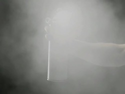 Spraying on black background Stock Footage
