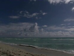 WS PAN Miami beach people sitting and walking on beach  / Everglades, Florida, USA  Stock Footage