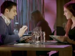 HD DOLLY: Couple Using Digital Card Menues Stock Footage