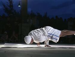 WS Man performing push ups on one hand /  Mississauga, Ontario, Canada. Stock Footage
