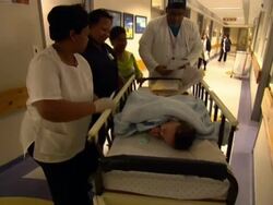 Baby has Operation to Remove Parasitic Twin News Clip