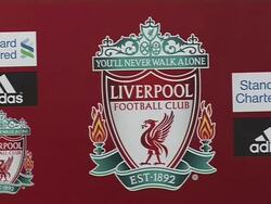 Liverpool FC press conference crest cutaway Stock Footage