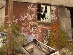 Pan of abandoned auto assembly plant Stock Footage