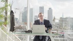 Businessman revealing superhero costume under suit Stock Footage