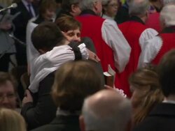 Bishop Libby Lane hugs husband News Clip