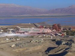 AERIAL TS WS Vertical view of downwards of dead sea salt on formations / Sourn Judea Desert, Israel  Stock Footage