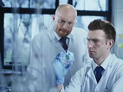 Scientists working in a research laboratory Stock Footage