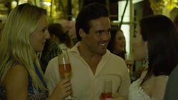 Spencer Matthews talks to Sabrina Ho at her birthday party at Oscar Wilde Bar, Hotel Cafe Royal on September 12, 2016 in London, England. Stock Footage