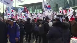 CLEAN : Relatives protest visit by N. Korea general over warship sinking News Clip