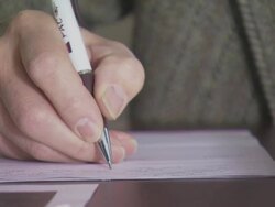 Man writing close up, USA Stock Footage