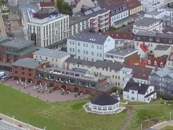 MS AERIAL ZO Shot over houses at Norderney island in Noth Sea / Norderney, Lower Saxony Stock Footage
