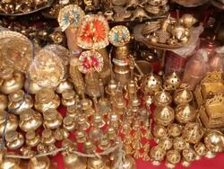 Brass articles on display in a market stall, Haridwar, Uttarakhand, India Stock Footage