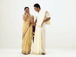 South Indian couple talking on a mobile phone  Stock Footage