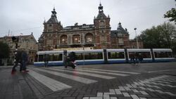 The Leidseplain is a busy square at the souther end of Amerdam's central canal ring.  The Leidseplein serves as a transport hub in the city, with a number of trolley lines intersecting here, as well as a center for nightlife and shopping. Stock Footage