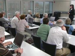 HD DOLLY: Seniors Participating Computer Lessons Stock Footage