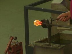 Glass Maker Forming Hot Glass Medium Shot Stock Footage