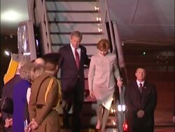 President George W Bush walks down aircraft steps at start of state visit Stock Footage