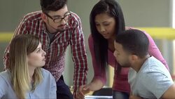 MS Four Students Using A Digital Tablet Stock Footage