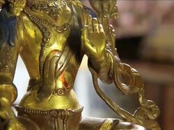 MS TU SLO MO Rotating golden Buddha statue  / Miami, Florida, United States Stock Footage