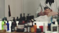 Barber preparing beard Stock Footage