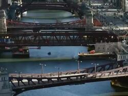 WS T/L ZO View of river and Wacker Drive showing rail, boat and motor vehicle traffic / Chicago, Illinois, United States Stock Footage